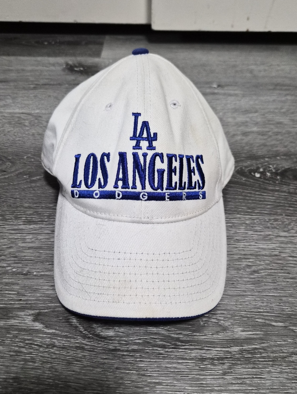Genuine Merchandise White Hat with Black Trim